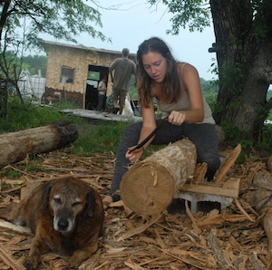 Judy and Jamie de-"barking" at the Critter work site. Photo by Katherine.