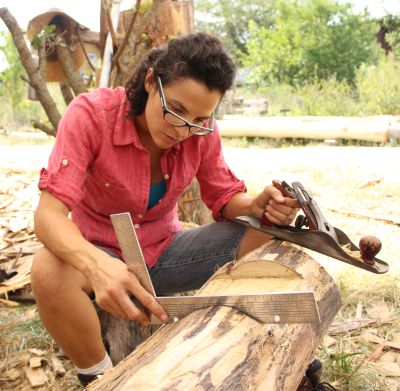 Rae learning to timberframe her new home.