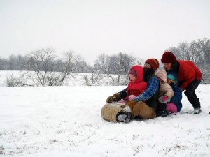 How many Rabbits can you fit on a toboggan? Thomas and Kassandra prepare the kids for a run down the hill. Photo by Brooke.