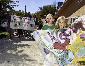 Tri-communitarians young and old marched down DR Main Street for the world-wide Climate March in September.