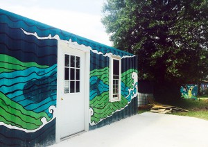 The shipping container grocery store is a work of work, inspired by Japanese nautical-motifs. Photo by Nik.