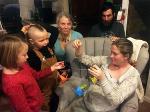 Mae's new paper crane mobile gets a fair share of onlookers. Photo by Katherine.