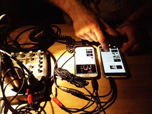 The modern DJ (aka Illly) in action at the DR NYE party. Photo by Kim Kanney.