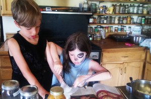 Max and Emma making cookies in their new co-op kitchen. Photo by Christina.