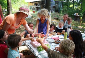 Aurelia (and friends) about to blow out candles on her 10th birthday cake! Photo by Steve Peters (aka Grandpa).