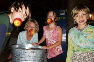 The kids bobbing for apples during the Hollerween fiasco! Photo by Aaron.