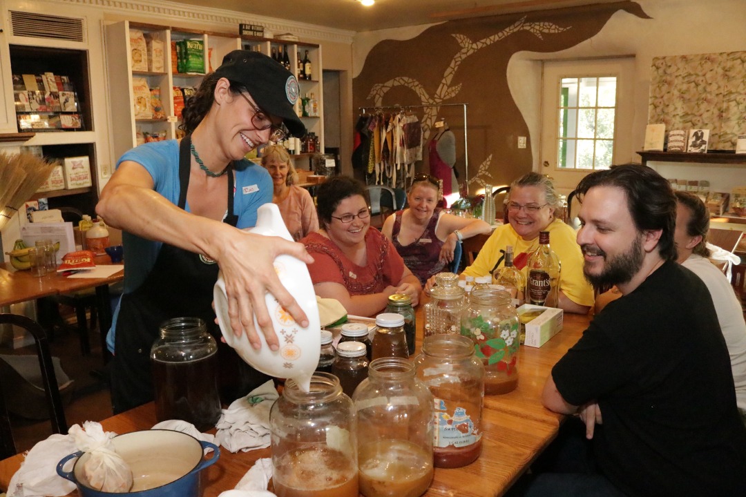 Rae is grateful for the opportunity to share her knowledge of fermenting foods with a new group of friends! Photo by Aaron
