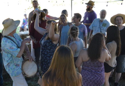Annie and Laurence leading a stand up and dance song circle!